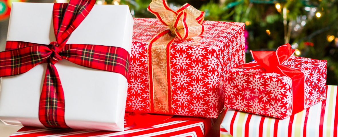 Christmas presents wrapped in colorful paper.